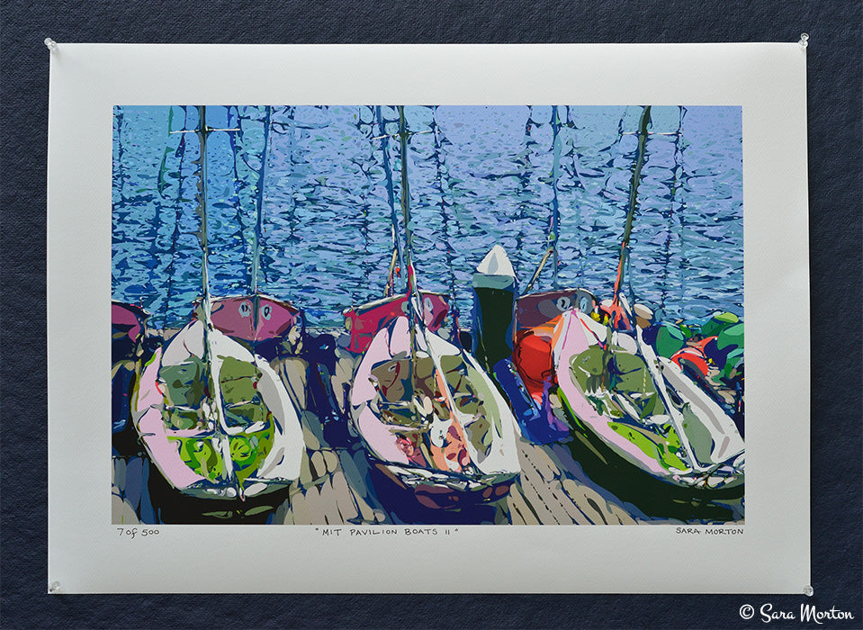 Vibrant fine art print of colorful MIT sailboats docked at the MIT Sailing Pavilion on the picturesque Charles River. Premium quality prints on stretched canvas and watercolor paper made with archival quality inks for long-lasting vibrancy.