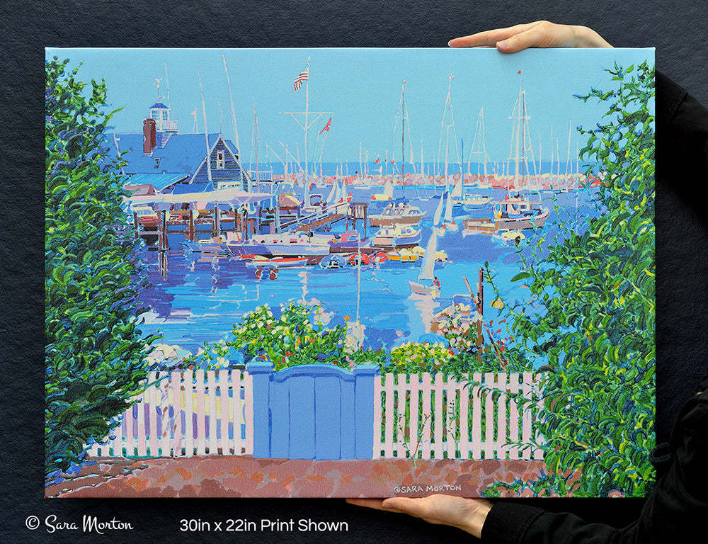 30x22 stretched canvas giclée print of Rockport Massachusetts harbor painting, Bearskin Neck view with boats, white picket fence, blue gate, and flowers.