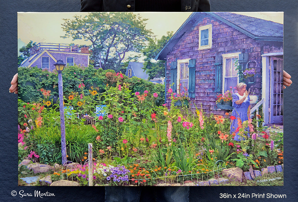 36x24 canvas art print of Rockport Antique Garden held in hand – Rockport MA flower garden artwork for scale