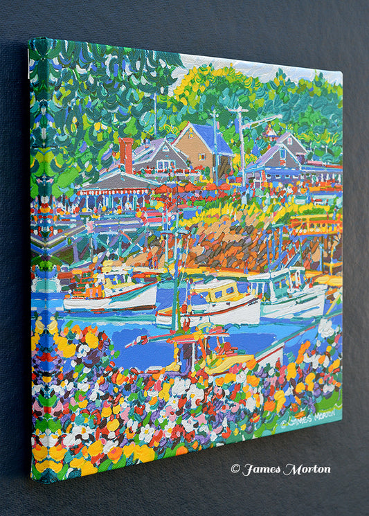 Left side angled view of canvas print showing boats and foreground flowers in Perkins Cove harbor.