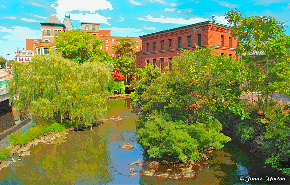 Fine art print of Baker’s Chocolate Mills in Milton and Dorchester, Massachusetts, viewed from Adams Street Bridge across the Neponset River.
