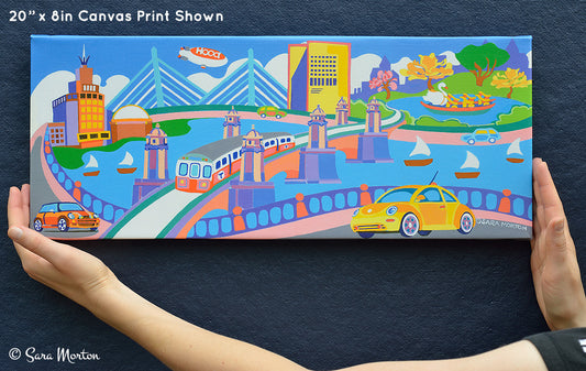 20in x 8in stretched canvas print of Boston Massachusetts painting titled Boston Bustle by Massachusetts Artist Sara Morton.  Photograph of ready to ship print held by hand for scale. A playful and colorful representation of the city of Boston. 