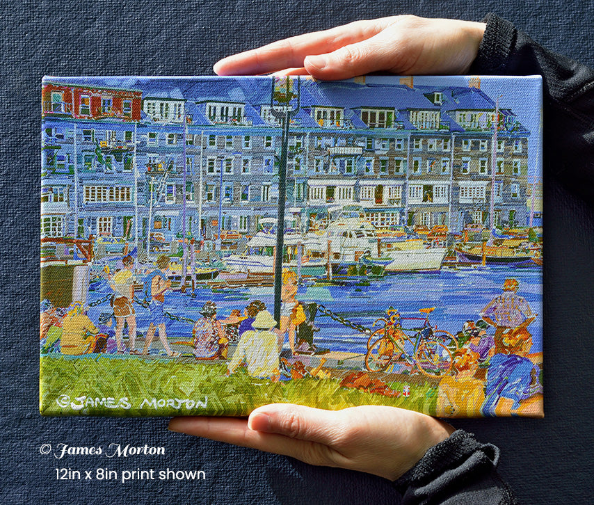 Hand-held 12x8 canvas print for scale featuring Commercial Wharf, Christopher Columbus Park, and recreational boats along Boston's waterfront.