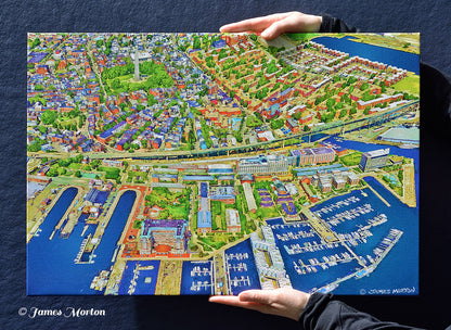 Hand-held 24 x 16 Charlestown Boston canvas print showing the artwork scale and aerial view of the historic waterfront neighborhood.
