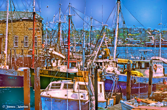 Gloucester harbor art print with fishing boats, lobster boats, masts, and brown boathouse at Old Fisherman’s Wharf.