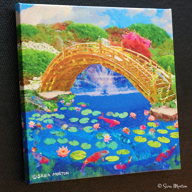 Painting of a bridge over a pond with lily pads and fish. Left side view of Koi Bridge 12x12 inch stretched canvas print showing wrapped image edge