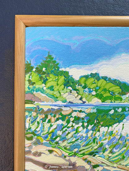 Close-up detail of Ocean Pond original acrylic painting showing textured brushstrokes, canvas weave, rocky shoreline, beach grasses, blue water, and the light wood frame surrounding this Ogunquit, Maine landscape.